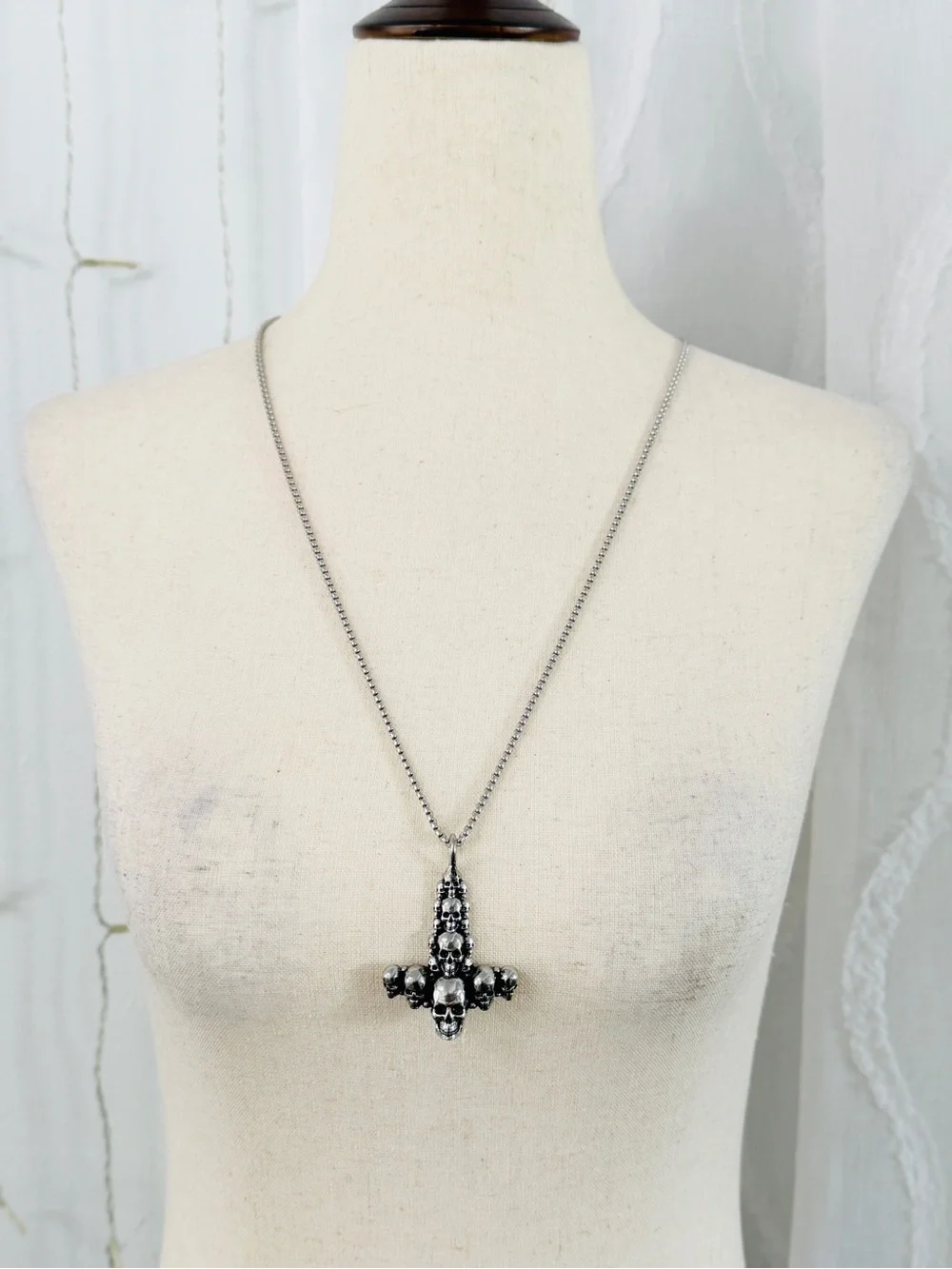 Skulls upside down cross silver necklace
